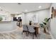 Bright dining space with modern table, seating, and connection to the kitchen area at 1161 Monaco Dr, Mount Pleasant, SC 29464