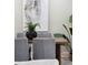 Close up of dining table and gray chairs, creating an inviting space to entertain at 1161 Monaco Dr, Mount Pleasant, SC 29464