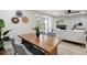 Dining area with wooden table, stylish chairs, and view to comfortable living room at 1161 Monaco Dr, Mount Pleasant, SC 29464