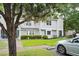 Exterior view of well-maintained home, grassy front yard and landscaped bushes at 1161 Monaco Dr, Mount Pleasant, SC 29464