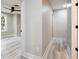 Hallway with access to bedroom featuring ceiling fan and ensuite bathroom at 1161 Monaco Dr, Mount Pleasant, SC 29464