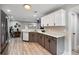 Bright kitchen featuring modern appliances, white and gray cabinets, and an open floor plan at 1161 Monaco Dr, Mount Pleasant, SC 29464