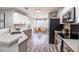 Well-lit kitchen featuring sleek stainless steel appliances, a breakfast nook with a view, and ample cabinet space at 1161 Monaco Dr, Mount Pleasant, SC 29464