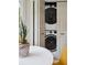 Conveniently located laundry area featuring a stacked washer and dryer at 1161 Monaco Dr, Mount Pleasant, SC 29464