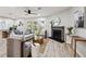 Bright living room with modern fireplace, neutral tones, and sliding glass doors leading to backyard at 1161 Monaco Dr, Mount Pleasant, SC 29464
