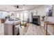 Bright and airy living room with modern decor, a cozy fireplace, and sliding doors to outdoor space at 1161 Monaco Dr, Mount Pleasant, SC 29464