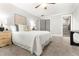 Cozy bedroom with a decorative wall hanging, plush carpeting, and soft neutral colors at 1211 Dennis Blvd, Moncks Corner, SC 29461