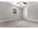 Comfortable bedroom with neutral walls, carpet, a built-in wardrobe, and a window at 1211 Dennis Blvd, Moncks Corner, SC 29461