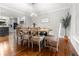 Bright dining room featuring hardwood floors, stylish chairs, and an elegant light fixture at 1211 Dennis Blvd, Moncks Corner, SC 29461