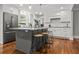 Modern kitchen with a large island, stainless steel appliances, and ample countertop space at 1211 Dennis Blvd, Moncks Corner, SC 29461