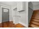 Convenient laundry area features granite countertops, white cabinets, and gray door at 1211 Dennis Blvd, Moncks Corner, SC 29461