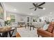 Bright living room with hardwood floors, neutral paint, ceiling fan, and modern decor at 1211 Dennis Blvd, Moncks Corner, SC 29461