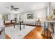 Spacious living room featuring hardwood floors, comfortable seating, and plenty of natural light at 1211 Dennis Blvd, Moncks Corner, SC 29461
