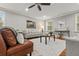 Cozy living room with a ceiling fan, hardwood floors, and comfortable seating arrangement at 1211 Dennis Blvd, Moncks Corner, SC 29461