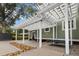 Outdoor patio with a white pergola, a swing, and a view of the fenced backyard at 1211 Dennis Blvd, Moncks Corner, SC 29461