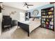 Inviting bedroom featuring a black bed frame with matching bookcase and desk at 125 Spring Meadows Dr, Summerville, SC 29485
