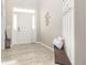 Inviting entryway features wood-look floors, a white front door, and stylish decor at 125 Spring Meadows Dr, Summerville, SC 29485