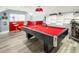 Fun game room with a red felt pool table, bar area, and unique decorations at 125 Spring Meadows Dr, Summerville, SC 29485