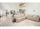 Bright living room features soaring ceilings, modern flooring and flows into the kitchen area at 125 Spring Meadows Dr, Summerville, SC 29485