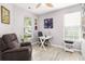 Cozy office features wood-look floors, natural light, and a comfortable recliner at 125 Spring Meadows Dr, Summerville, SC 29485