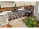 Outdoor kitchen featuring a built-in grill and stone counter tops, great for entertaining at 125 Spring Meadows Dr, Summerville, SC 29485