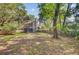 The home's backyard has mature trees, and a screened-in porch. Great place to spend time outdoors at 1253 Horseshoe Bnd, Mount Pleasant, SC 29464