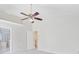 Bright bedroom with carpeted floors and a ceiling fan. Doorways into the attached bathroom visible at 1253 Horseshoe Bnd, Mount Pleasant, SC 29464