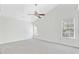 Spacious bedroom features a ceiling fan, carpeted floors, and ample natural light from the multiple windows at 1253 Horseshoe Bnd, Mount Pleasant, SC 29464