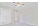 Bedroom with carpet, ceiling fan, closet, and an entry door at 1253 Horseshoe Bnd, Mount Pleasant, SC 29464