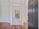 Bright foyer featuring hardwood flooring and staircase leading to the upper level at 1253 Horseshoe Bnd, Mount Pleasant, SC 29464