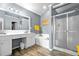 Bathroom featuring dual vanities, soaking tub, and a glass-enclosed shower at 126 Thousand Oaks Cir, Goose Creek, SC 29445