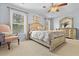 Cozy bedroom with natural light, a ceiling fan, and neutral decor at 126 Thousand Oaks Cir, Goose Creek, SC 29445