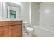 Cozy bathroom with vanity, toilet, and shower/tub combination with white tile at 1350 Wild Goose Trl, Summerville, SC 29483