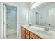 Bathroom featuring double sink vanity, large mirror, and shower/tub at 1350 Wild Goose Trl, Summerville, SC 29483