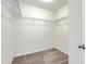 Walk-in closet with shelving and carpeted floor at 1350 Wild Goose Trl, Summerville, SC 29483