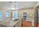 Gourmet kitchen boasts stainless steel appliances, granite countertops, and ample cabinet space at 1350 Wild Goose Trl, Summerville, SC 29483