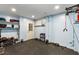 Basement gym with weights, shelving, rubber flooring, and pull-up bar at 1417 S Jetties Ct, Mount Pleasant, SC 29466
