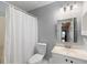 Cozy bathroom with a shower and tub, vanity with sink, neutral paint, and bright lighting at 1417 S Jetties Ct, Mount Pleasant, SC 29466