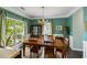 Elegant dining room featuring wood table, and large window views and lots of light at 1417 S Jetties Ct, Mount Pleasant, SC 29466