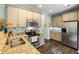 Well-equipped kitchen featuring stainless steel appliances, granite countertops, and ample storage at 1417 S Jetties Ct, Mount Pleasant, SC 29466