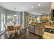 Inviting breakfast nook in kitchen offering natural light and an adjacent cooking area at 1417 S Jetties Ct, Mount Pleasant, SC 29466