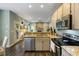 Bright kitchen featuring stainless steel appliances, granite countertops, and an open floor plan concept at 1417 S Jetties Ct, Mount Pleasant, SC 29466