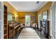 Cozy living room with neutral walls, hardwood floors, window views, comfortable furniture, and plenty of natural light at 1417 S Jetties Ct, Mount Pleasant, SC 29466
