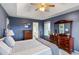 Spacious bedroom with a ceiling fan, an ensuite bathroom, and ample natural light at 1417 S Jetties Ct, Mount Pleasant, SC 29466