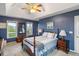 Comfortable main bedroom with lots of natural light, a ceiling fan, and tasteful decor at 1417 S Jetties Ct, Mount Pleasant, SC 29466