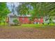 Expansive backyard with leafy trees and foliage providing privacy and shade at 1430 Brian Rd, Charleston, SC 29407