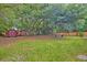 Spacious backyard with mature trees, offering a serene outdoor living space at 1430 Brian Rd, Charleston, SC 29407
