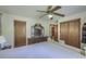 Bedroom with ceiling fan and large dresser at 1430 Brian Rd, Charleston, SC 29407