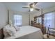Traditional bedroom with four-poster bed, dresser, and natural light at 1430 Brian Rd, Charleston, SC 29407