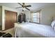 Comfortable bedroom featuring a ceiling fan, large bed, window and built-in shelving at 1430 Brian Rd, Charleston, SC 29407
